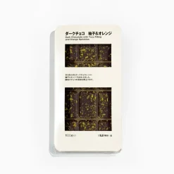 Sale Muji Chocolat noir fourré de yuzu et de pépites d'oranges