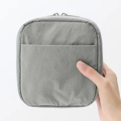 Discount Muji Trousse de maquillage à poser en nylon texturé